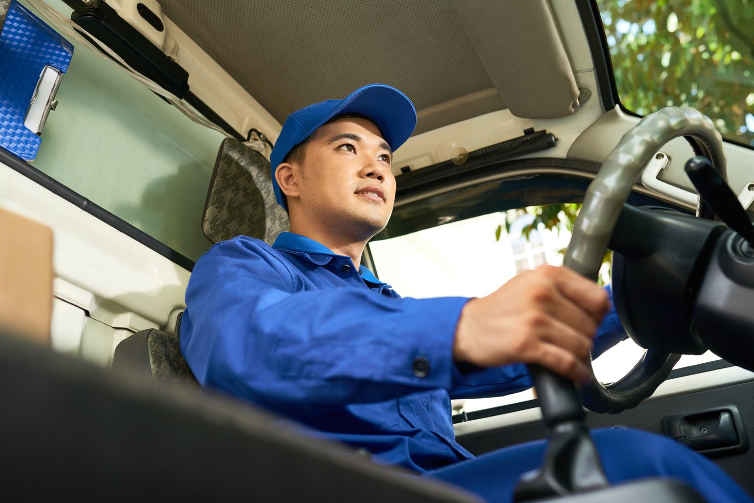 Delivery Man Driving Truck